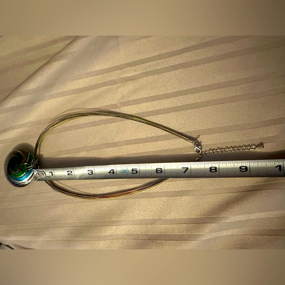 A 14 metal strand artisan piece with matching glass pendant. About a 16” length - Picture 4 of 5